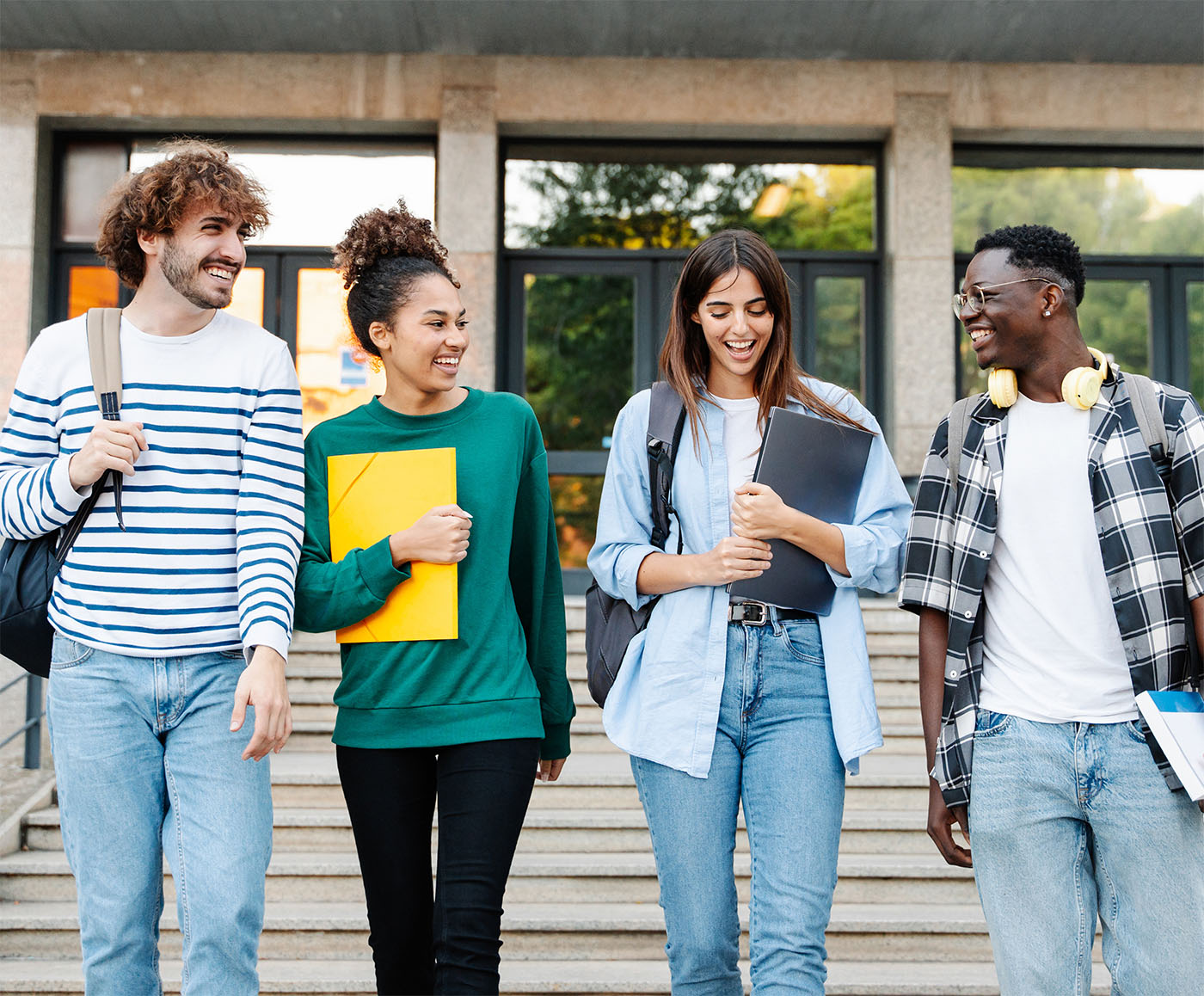 Students walking on college campus together